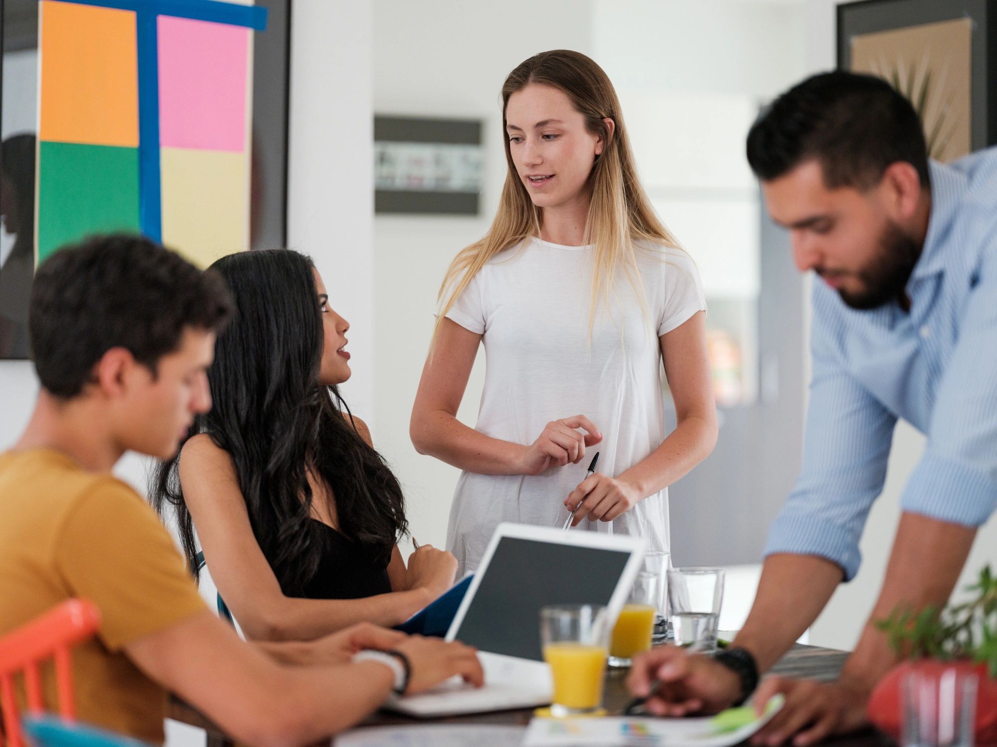 Creative team collaborating during a brand strategy meeting