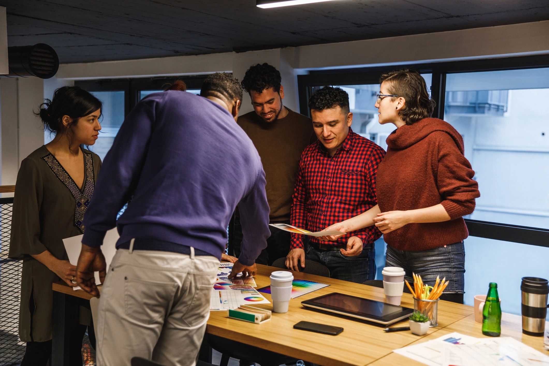 Creative professionals collaborating in an office