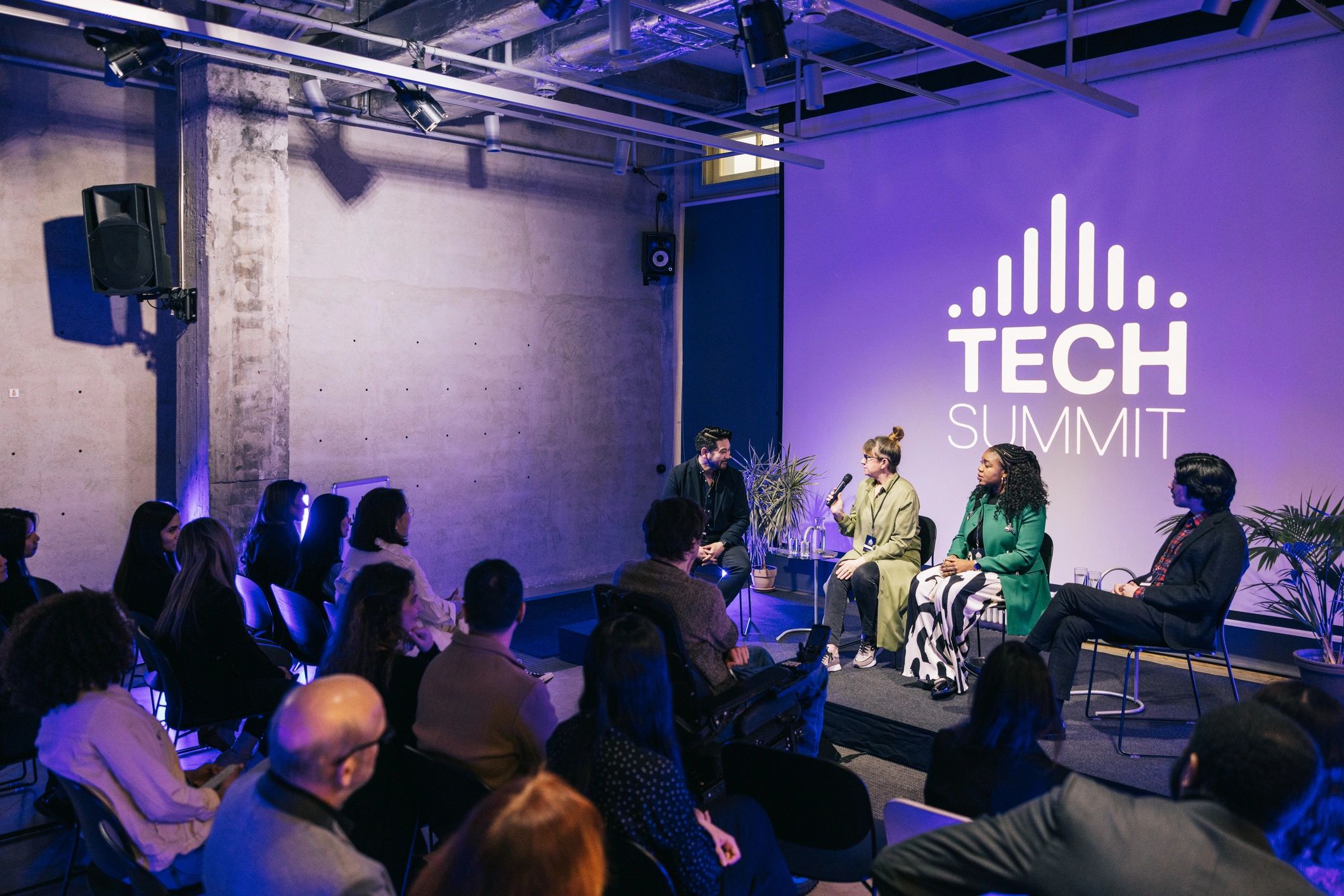 Audience engaged during a startup branding presentation