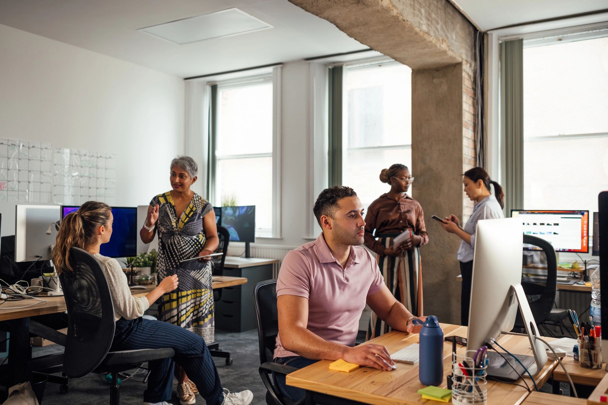 Team planning content strategy in an office